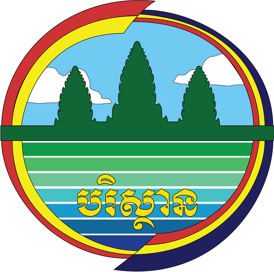 Circular emblem featuring a landscape with pine trees, blue sky, and rainbow-colored stripes, with khmer script in the center.