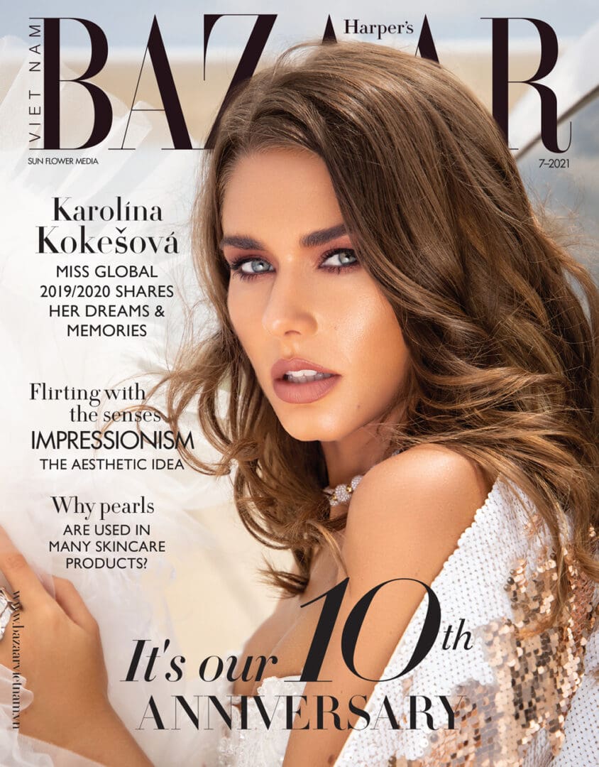 Cover of harper's bazaar vietnam, july 2021 issue, featuring a close-up of a female model with wavy hair and sequin attire, looking at the camera.