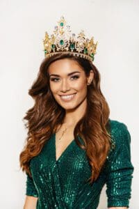 Miss Global 2019 MAIN HEADSHOT in a green dress